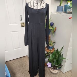 Logilates Black Jumpsuit with Square Neckline and Long Sleeves